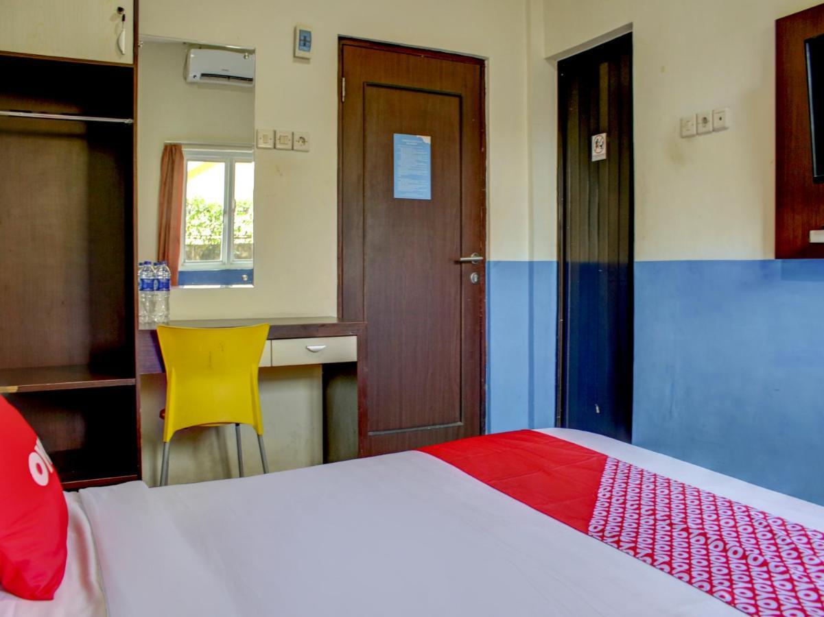 Oyo 90162 Remboelan Guest House Sungai Lutus Dış mekan fotoğraf
