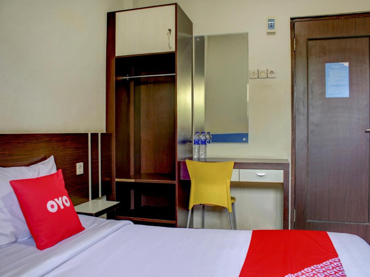 Oyo 90162 Remboelan Guest House Sungai Lutus Dış mekan fotoğraf