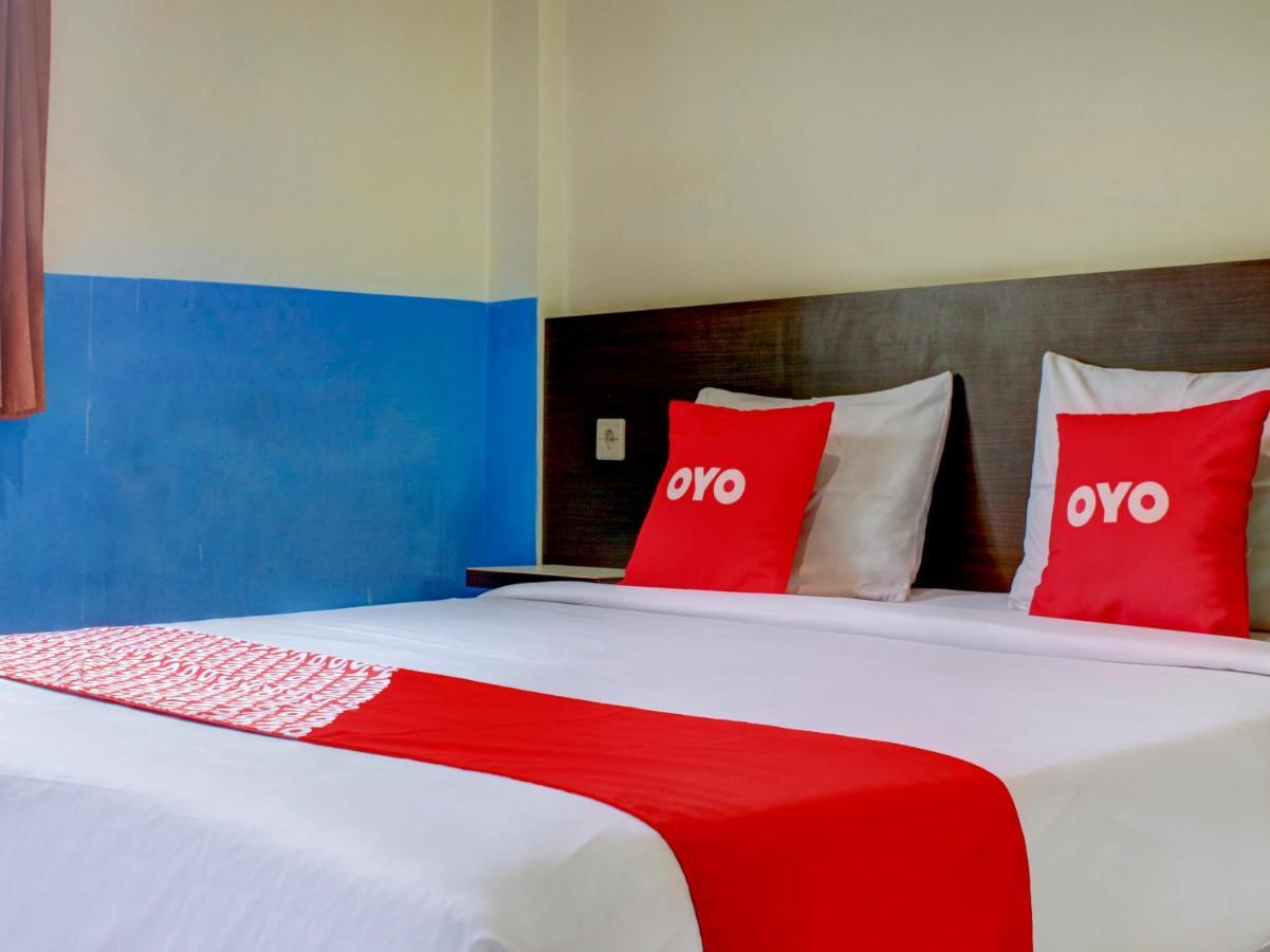 Oyo 90162 Remboelan Guest House Sungai Lutus Dış mekan fotoğraf