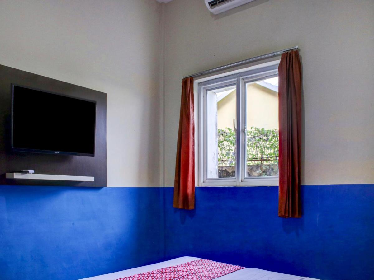 Oyo 90162 Remboelan Guest House Sungai Lutus Dış mekan fotoğraf
