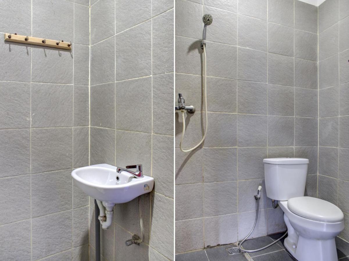 Oyo 90162 Remboelan Guest House Sungai Lutus Dış mekan fotoğraf